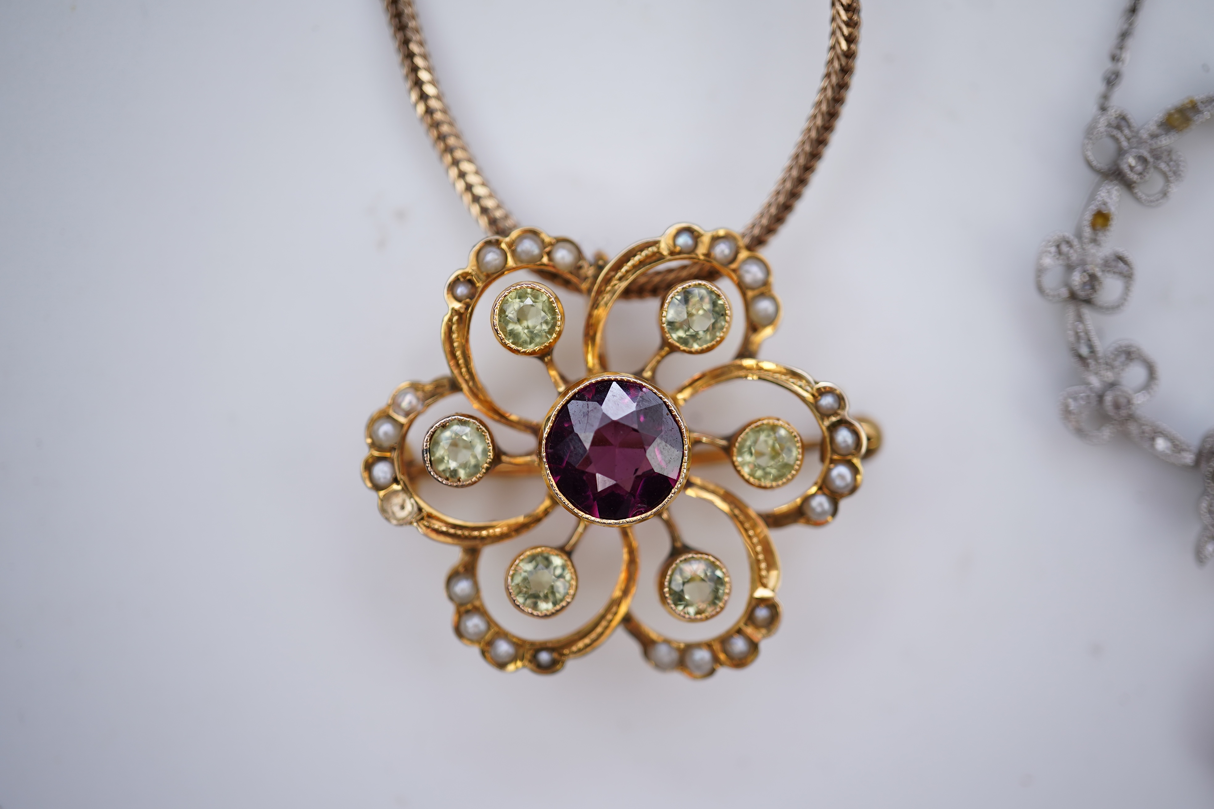 Three Edwardian gem-set pendants, early 20th century